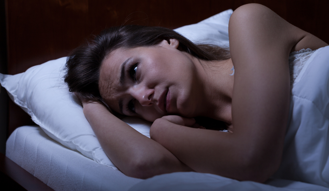 woman sleeping with anxiety